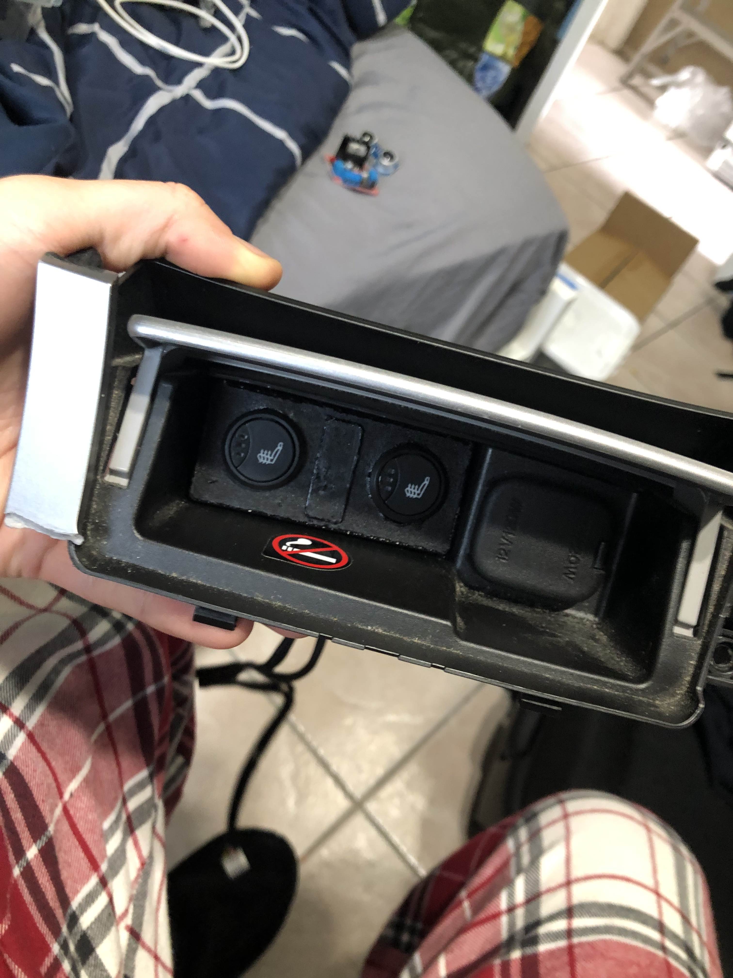 Buttons and mount installed in removed trim piece