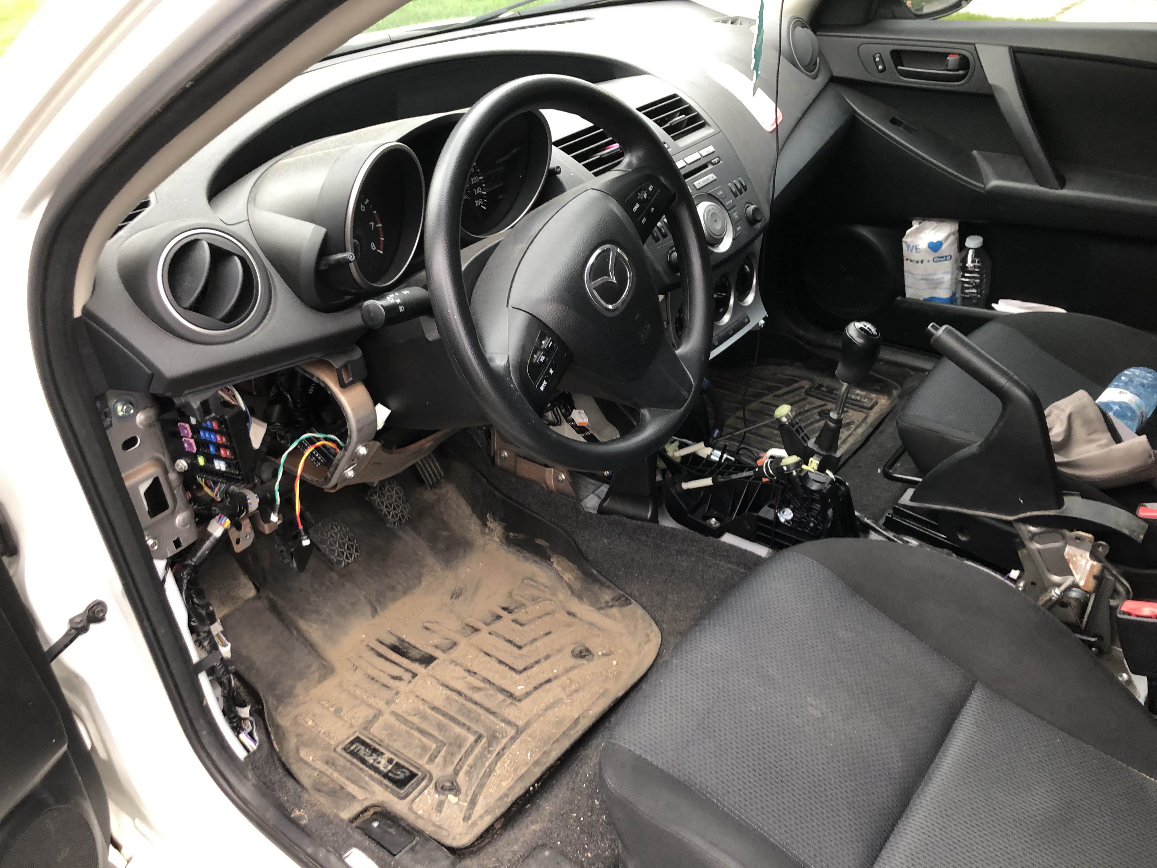 Interior completed gutted of trim, wires hanging