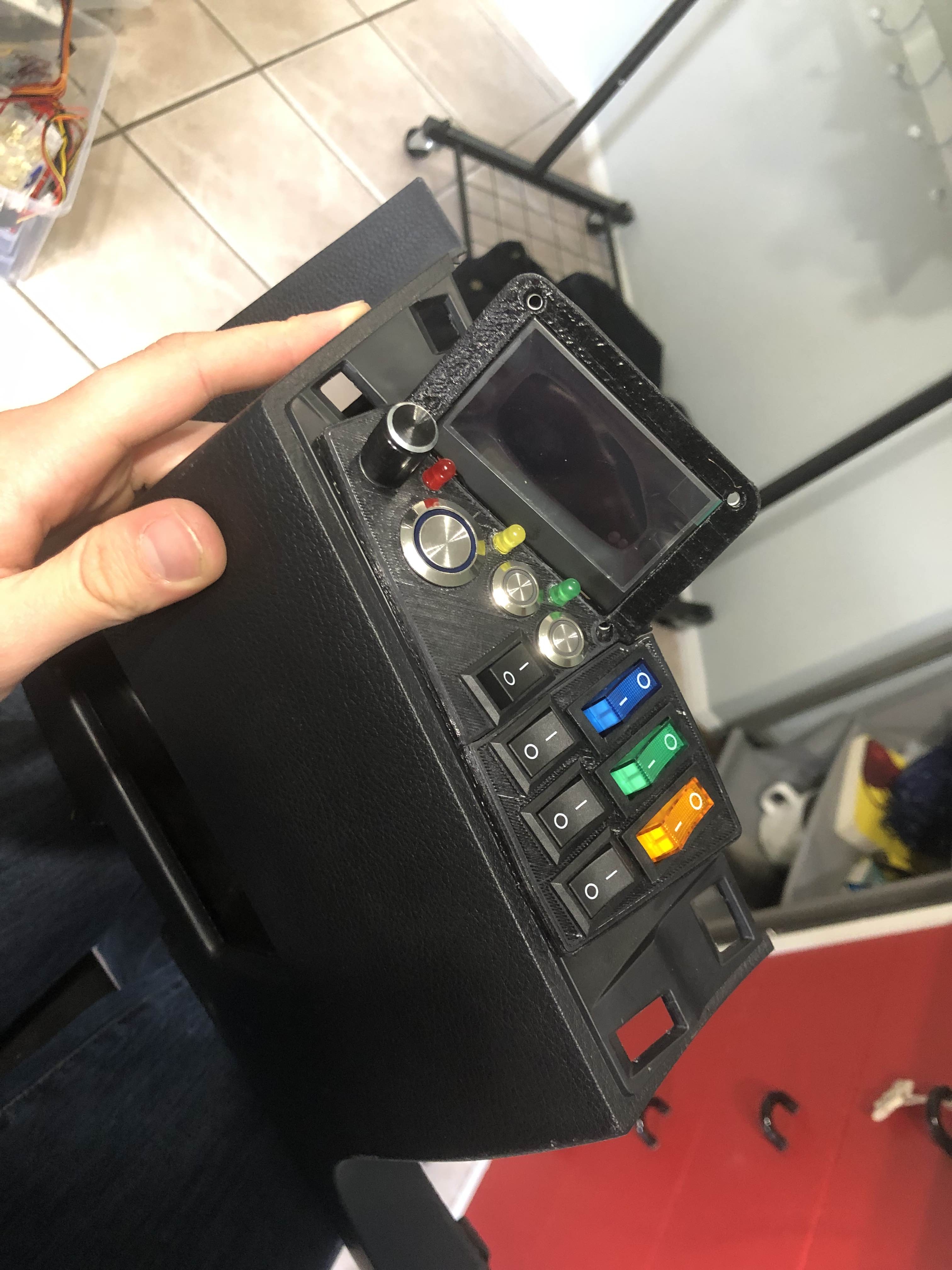 3D print of the model with switches and a button in place